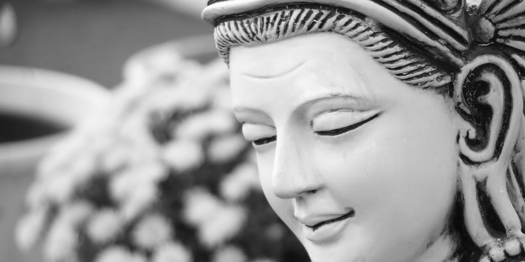a close up of a statue of a woman