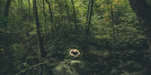 person in forest during daytime